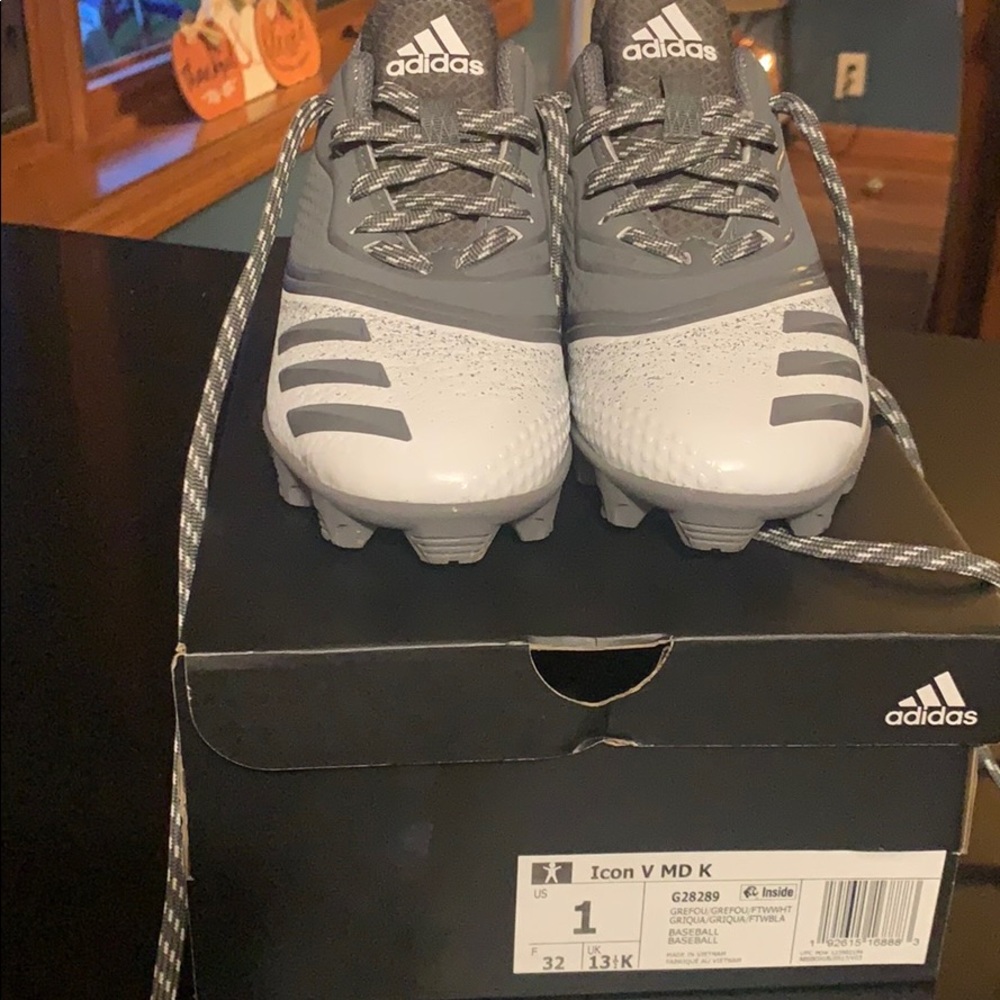 Boys Adidas baseball cleats. New, never worn.